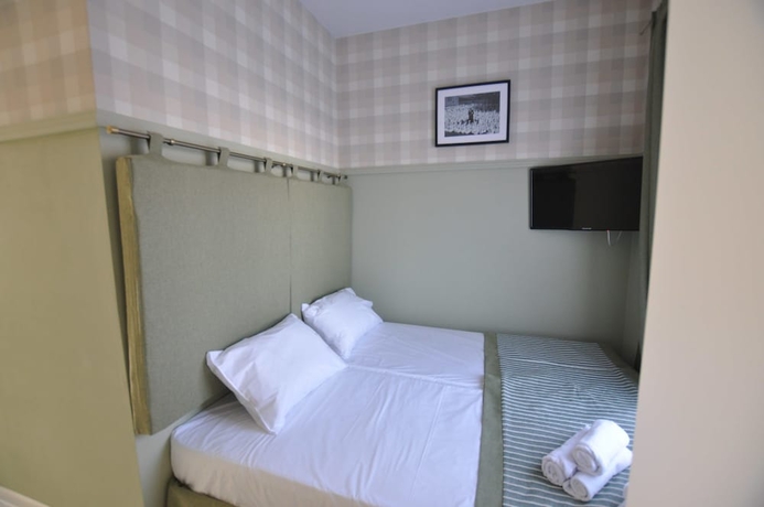 Imagen de la habitación del Hotel Gus House. Foto 13