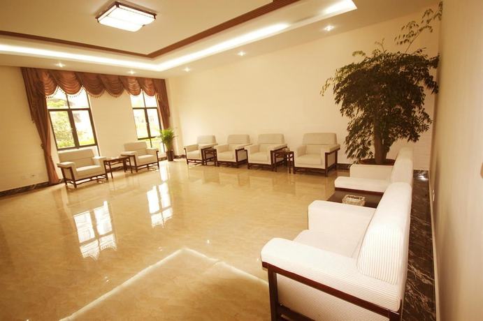 Imagen de los interiores del Hotel Gushen Hotel Mile Branch. Foto 13