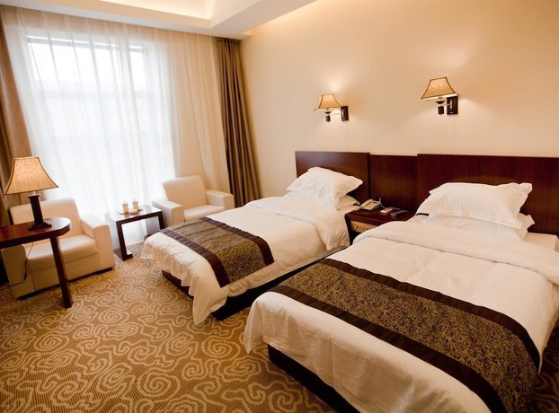 Imagen general del Hotel Gushen Hotel Mile Branch. Foto 2