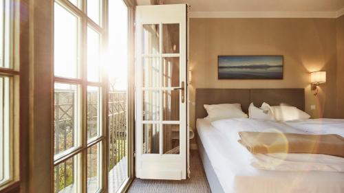 Imagen de la habitación del Hotel Gutsgasthof Stangl, Neufarn. Foto 5