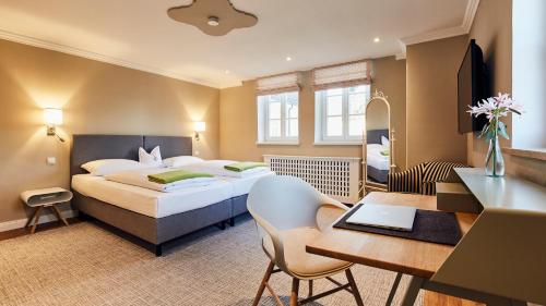 Imagen de la habitación del Hotel Gutsgasthof Stangl, Neufarn. Foto 6