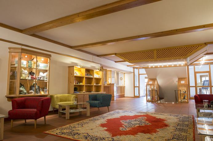 Imagen del bar/restaurante del Hotel Gutshof Wolfgangsee Resort and Event. Foto 7