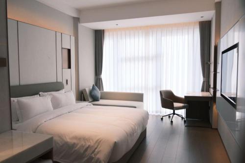 Imagen de la habitación del Hotel Guus. Foto 17