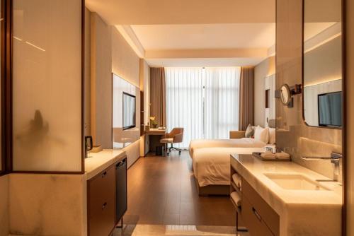 Imagen de la habitación del Hotel Guus. Foto 18