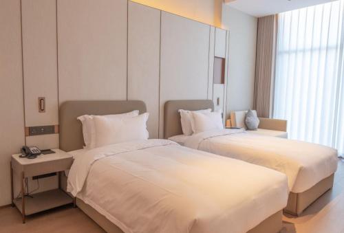 Imagen de la habitación del Hotel Guus. Foto 19