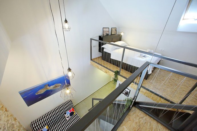 Imagen de la habitación del Hotel Guverna New City Accommodation. Foto 3