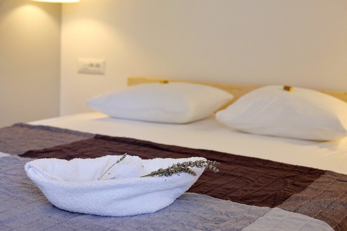 Imagen de la habitación del Hotel Guverna New City Accommodation. Foto 6