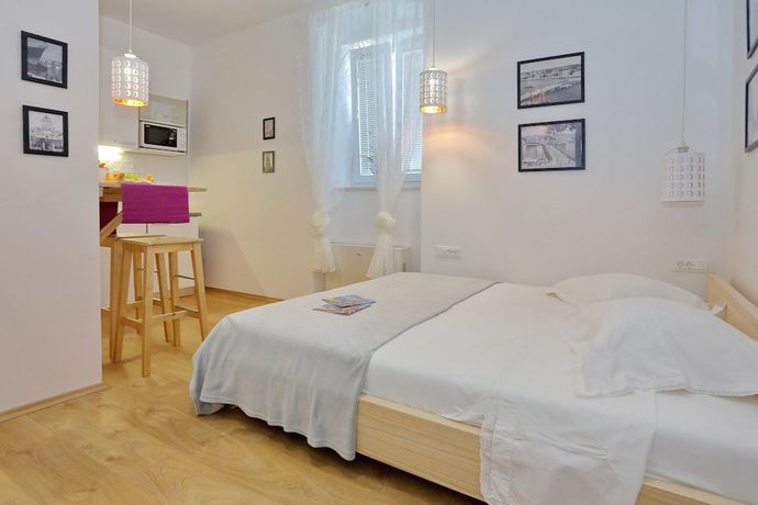 Imagen de la habitación del Hotel Guverna New City Accommodation. Foto 8