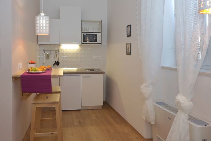 Imagen de la habitación del Hotel Guverna New City Accommodation. Foto 11