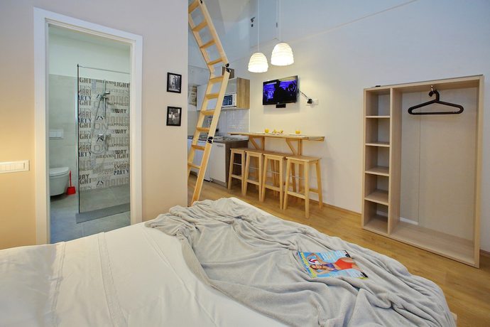 Imagen de la habitación del Hotel Guverna New City Accommodation. Foto 14