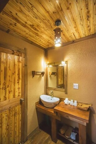 Imagen de la habitación del Hotel Guyue Caotang Inn. Foto 11