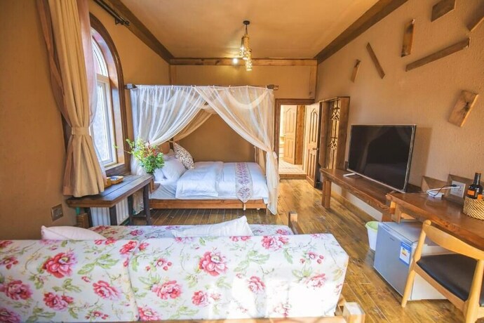 Imagen de la habitación del Hotel Guyue Caotang Inn. Foto 15