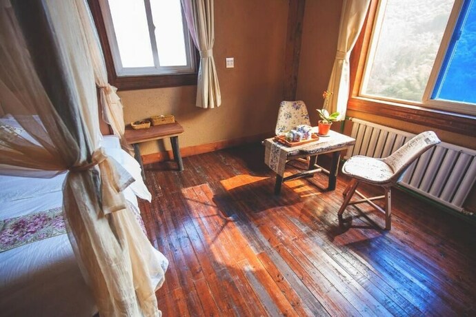 Imagen de la habitación del Hotel Guyue Caotang Inn. Foto 20