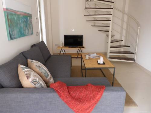 Imagen de la habitación del Hotel Guzman El Bueno Suites. Foto 2