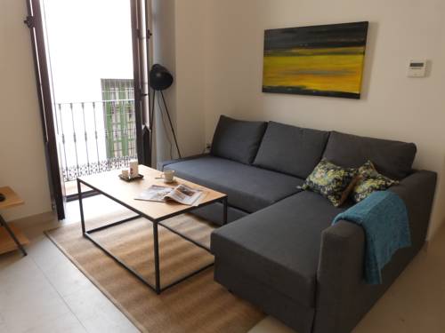 Imagen de la habitación del Hotel Guzman El Bueno Suites. Foto 9