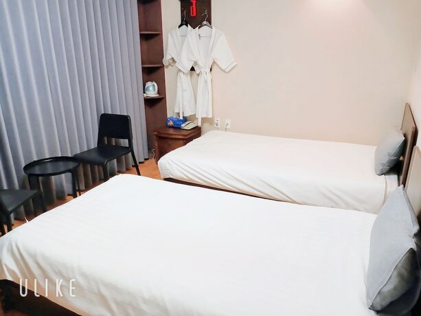 Imagen de la habitación del Hotel Gwanghwa Fresia. Foto 18