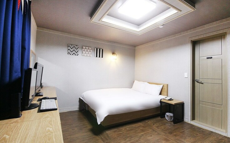 Imagen de la habitación del Hotel Gwangju Sinandong Zeus. Foto 18