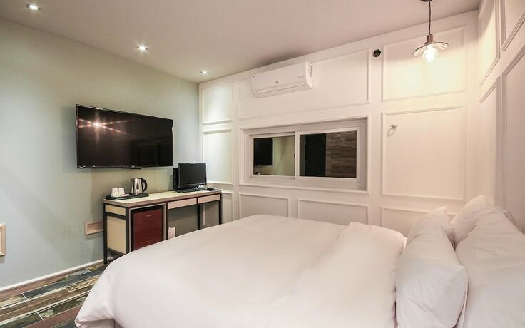 Imagen de la habitación del Hotel Gwangyang Yongam Good Day. Foto 24