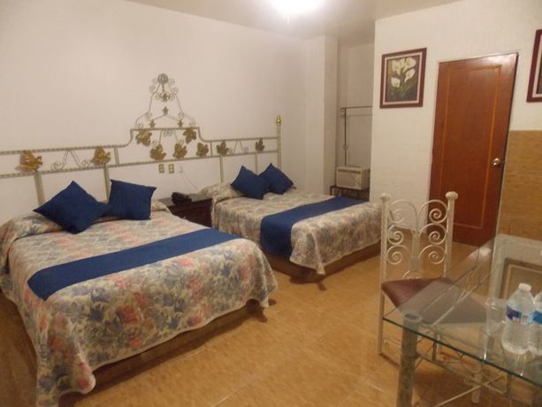 Imagen de la habitación del Hotel Gya Express. Foto 2
