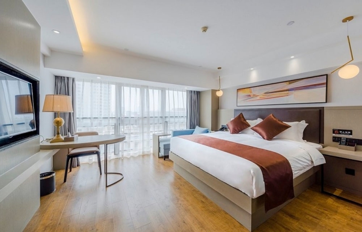 Imagen de la habitación del Hotel Gya Jin Ji Lake Oriental Gate. Foto 10