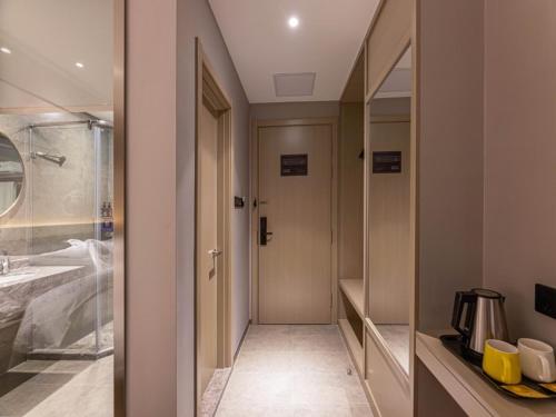 Imagen de la habitación del Hotel Gya Suzhou Hanshan Temple Binhe Road. Foto 17