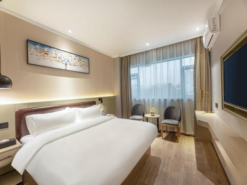 Imagen de la habitación del Hotel Gya Suzhou Hanshan Temple Binhe Road. Foto 18