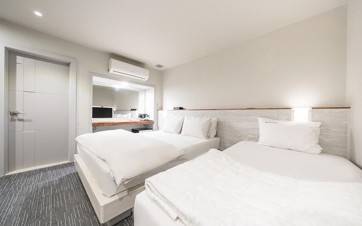 Imagen de la habitación del Hotel Gyeongsan Grand. Foto 19