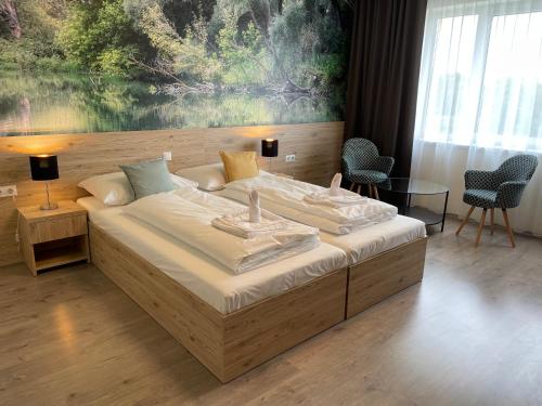 Imagen de la habitación del Hotel Gyirm&oacute;t Sport & Wellness. Foto 11