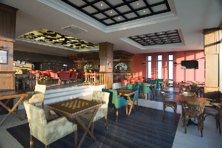 Imagen del bar/restaurante del Hotel Gypsophila Holiday Village. Foto 4