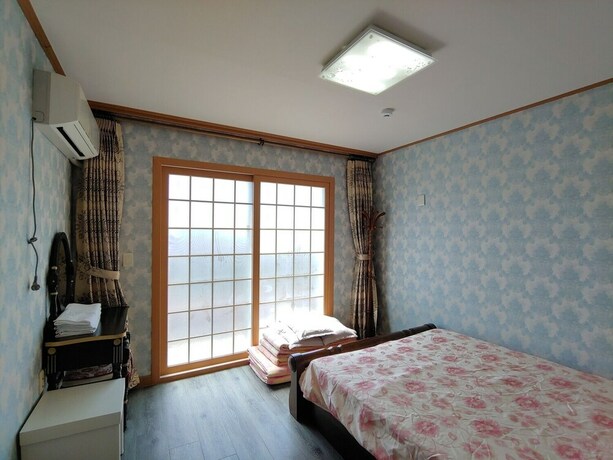 Imagen de la habitación del Hotel Gyul House. Foto 24