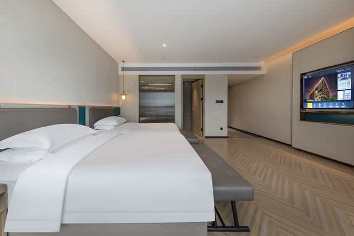 Imagen de la habitación del Hotel Gz Baiyun Airport Mehood Liz T1. Foto 17