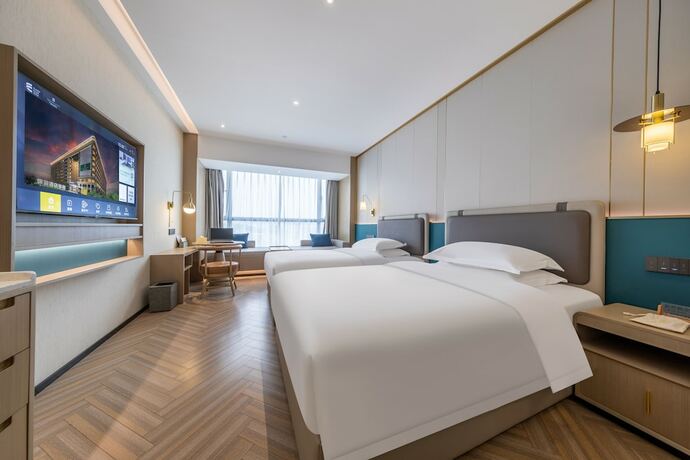 Imagen de la habitación del Hotel Gz Baiyun Airport Mehood Liz T1. Foto 19