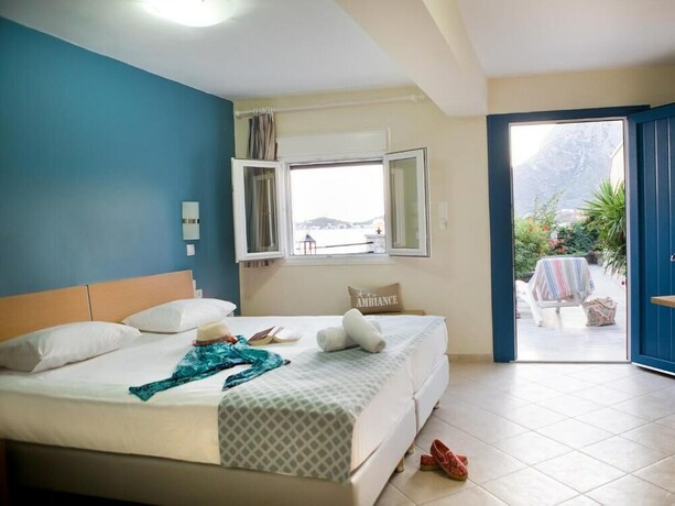 Imagen de la habitación del Hotel H Ambiance Studios. Foto 21