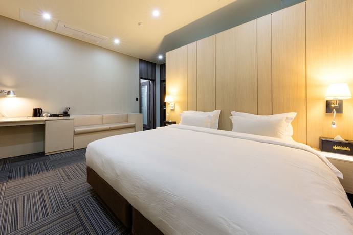 Imagen de la habitación del Hotel H Avenue Sangmu. Foto 4