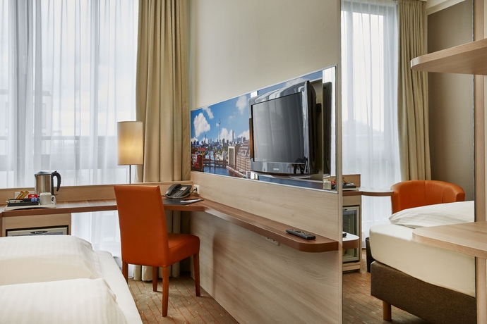 Imagen de la habitación del Hotel H+ Berlin Mitte. Foto 11