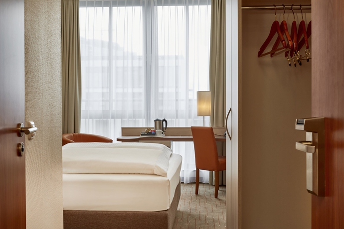 Imagen de la habitación del Hotel H+ Berlin Mitte. Foto 16