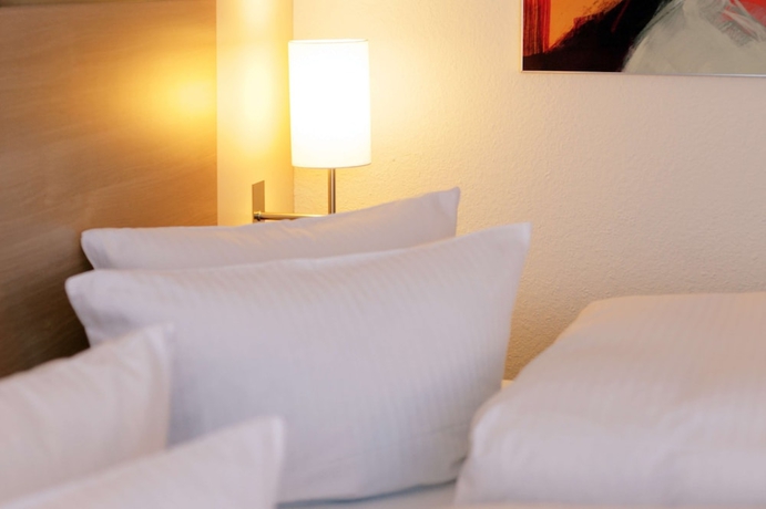 Imagen de la habitación del Hotel H+ Bochum. Foto 14