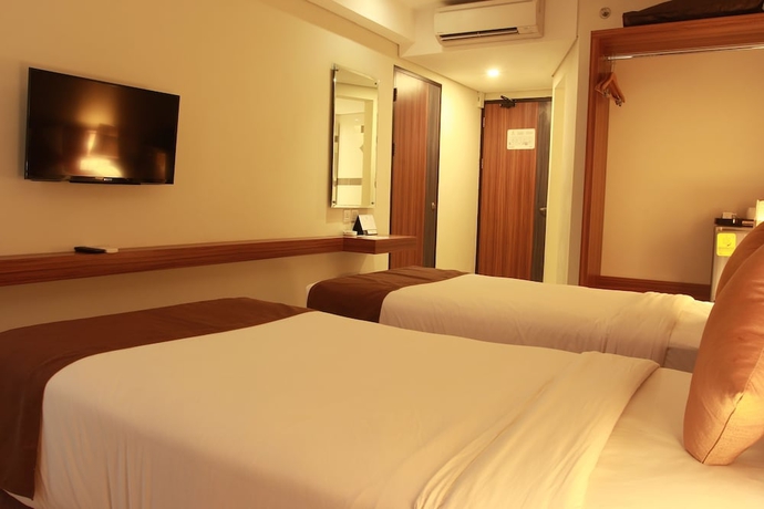 Imagen de la habitación del Hotel H Boutique Jogjakarta. Foto 16