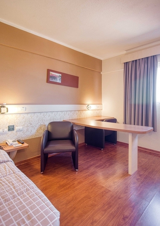 Imagen de la habitación del Hotel H+. Foto 11