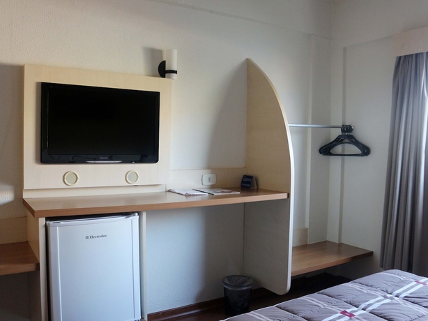 Imagen de la habitación del Hotel H+. Foto 12