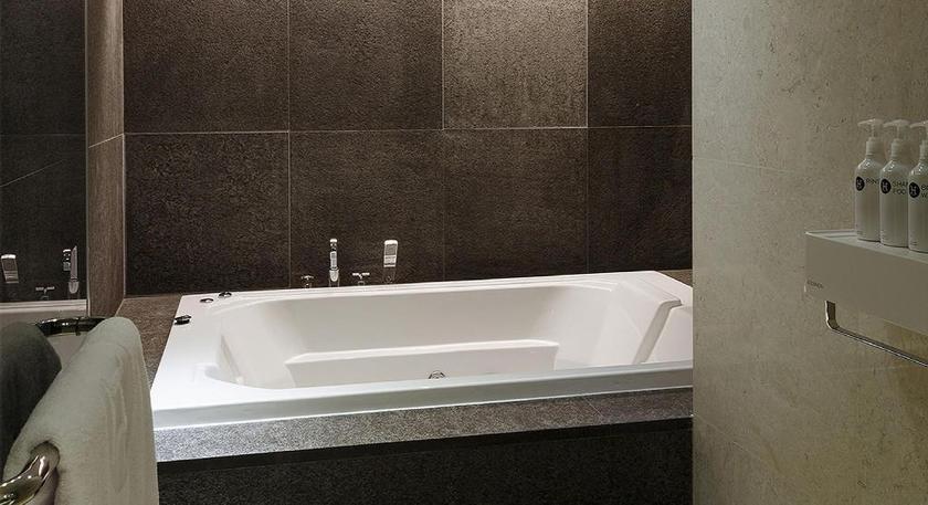 Imagen de la habitación del Hotel H Hotel. Foto 7