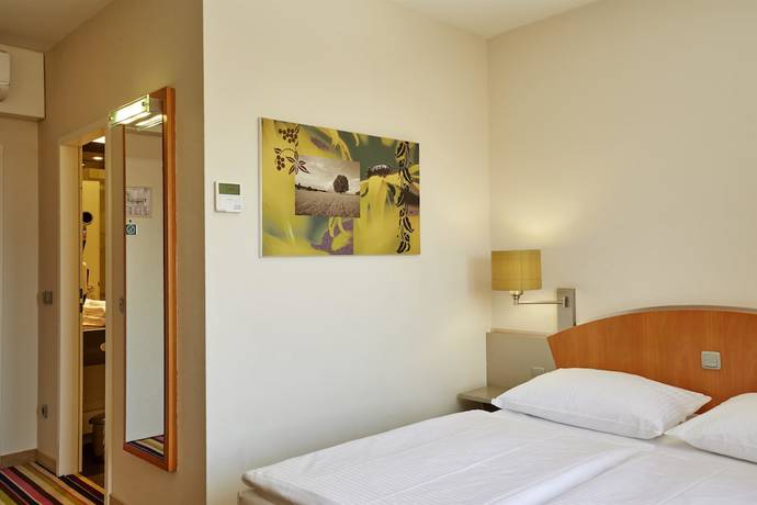 Imagen de la habitación del Hotel H+ Hotel Koln Hurth. Foto 1