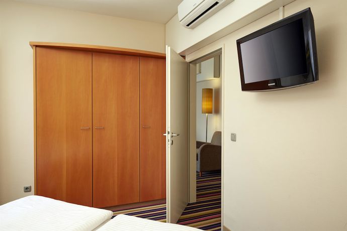 Imagen de la habitación del Hotel H+ Hotel Koln Hurth. Foto 9