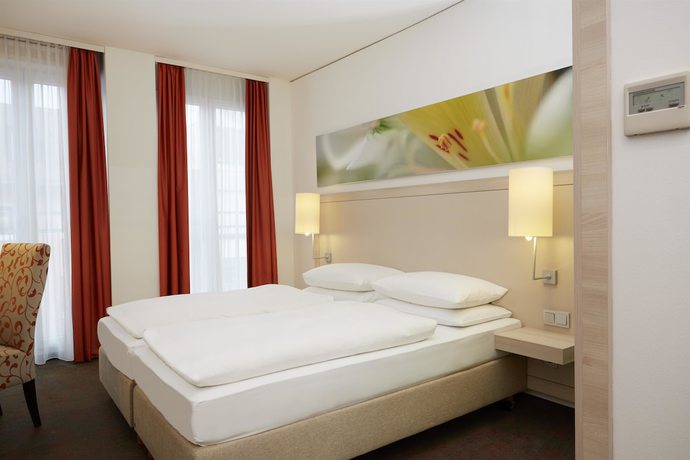 Imagen de la habitación del Hotel H+ Hotel Munchen. Foto 3
