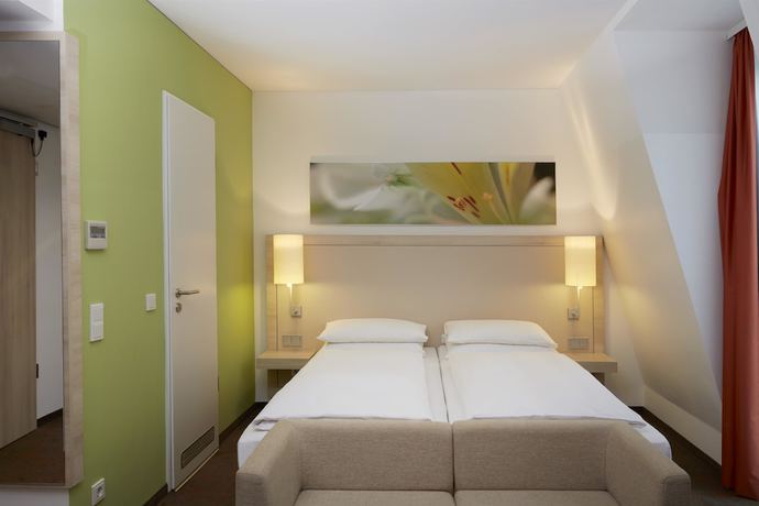 Imagen de la habitación del Hotel H+ Hotel Munchen. Foto 17