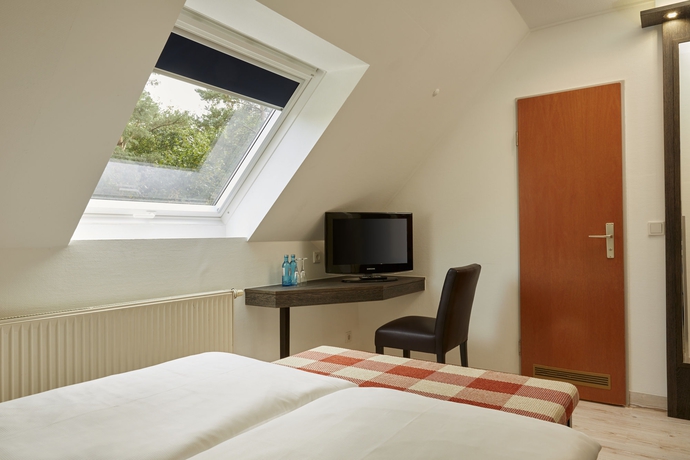 Imagen de la habitación del Hotel H+ Hotel Nurnberg. Foto 5