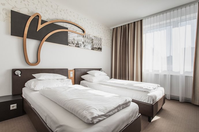 Imagen de la habitación del Hotel H+ Hotel Ried. Foto 7