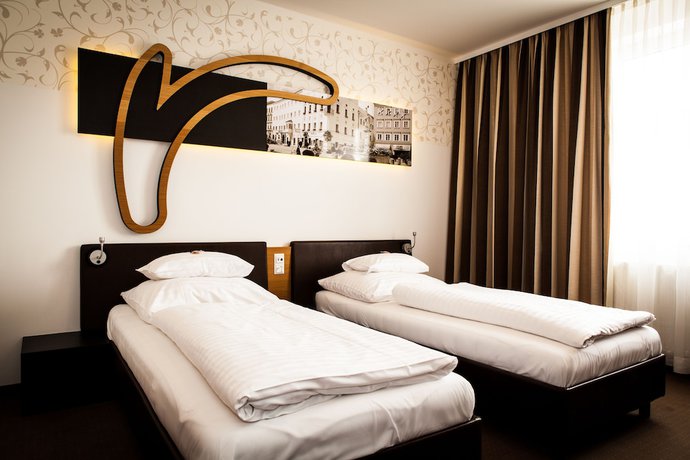 Imagen de la habitación del Hotel H+ Hotel Ried. Foto 9