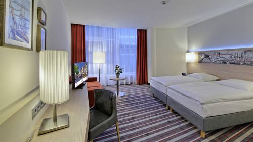 Imagen de la habitación del Hotel H+ Hotel Stade Herzog Widukind. Foto 3