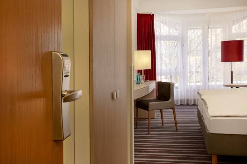 Imagen de la habitación del Hotel H+ Hotel Stade Herzog Widukind. Foto 6